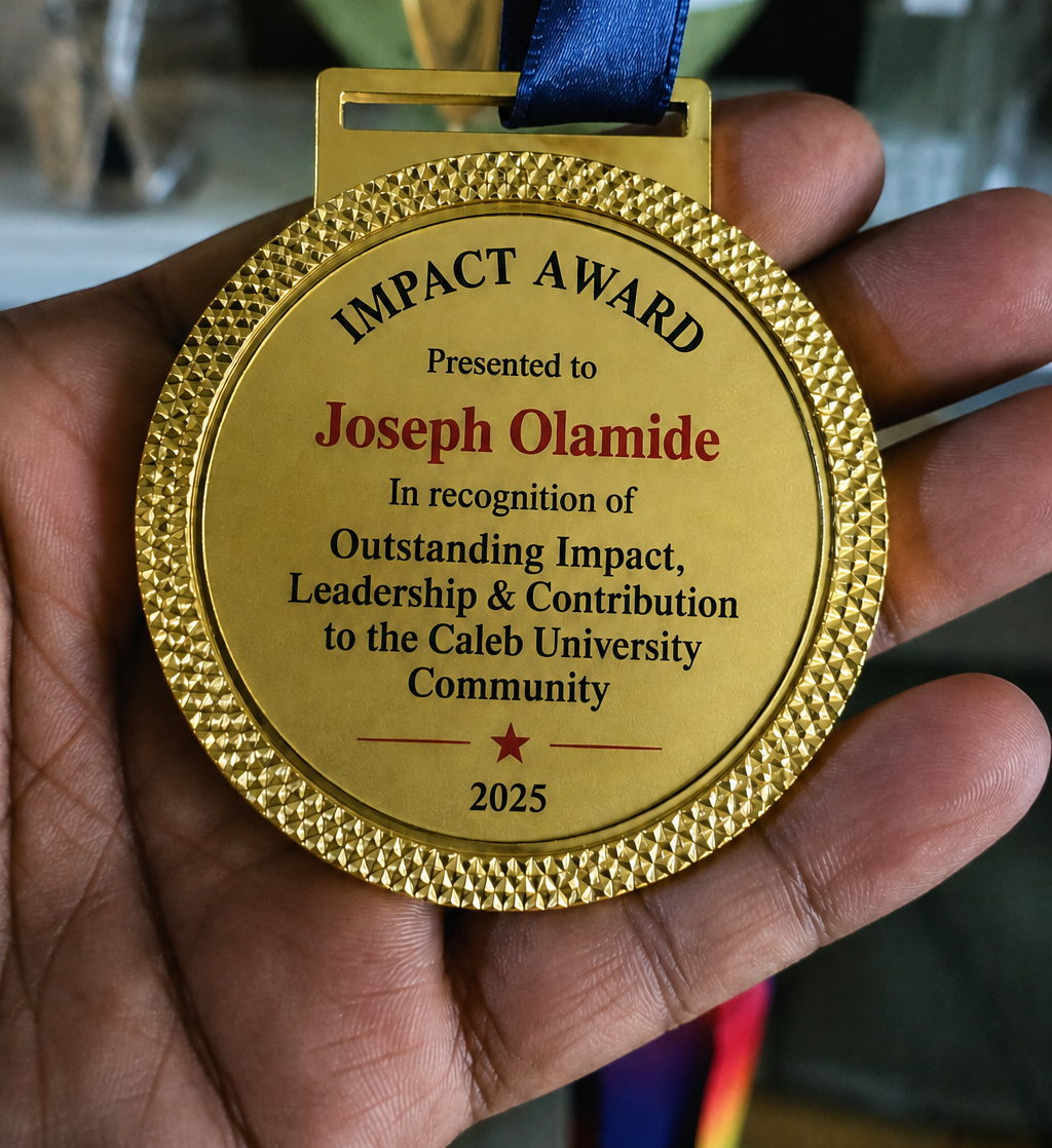 Joseph receiving an award on stage